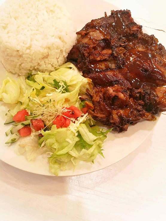 A serving of half-slab with rice at Canto Bogchi Joint Baguio Kisad road